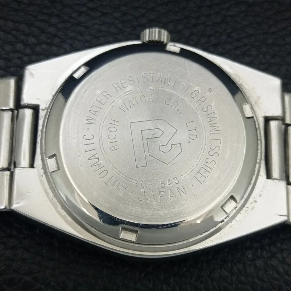 Vintage 1982 Ricoh Automatic Mens Silver Watch W/daydate & Red accents